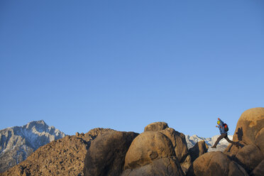 Adult man jumping in Alabama Hills - AURF05933