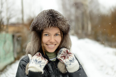 Woman in fur hat in winter, Moscow, Russia - AURF06104