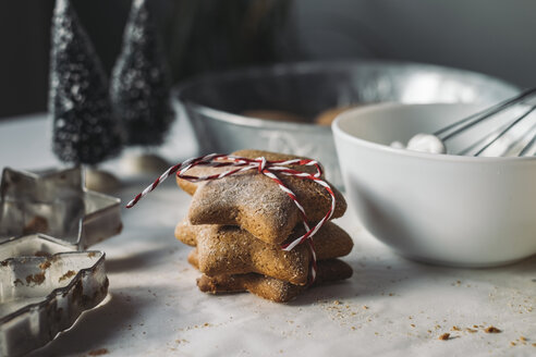 Stack of star-shaped Christmas Cookies - MOMF00493