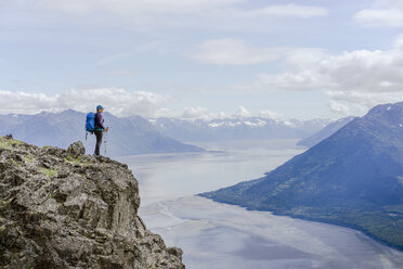 Female hiker at Hope Point in Chugach National Forest Alaska overlooking Turnagain Arm - AURF06246