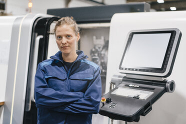 Young woman working as a skilled worker in a high tech company, portrait - KNSF04938