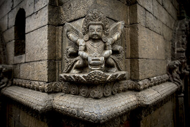 Stone statue on corner of Hindu temple at Pashupatinath, Kathmandu, Nepal - AURF06467