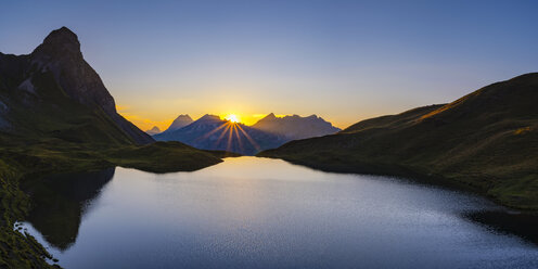 Germany, Bavaria, Allgaeu, Allgaeu Alps, Lake Rappensee, Kleiner Rappenkopf at sunset - WGF01254