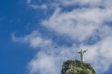 Paragliders flying above Christ the Redeemer statue on top of Corcovado Mountain, Rio de Janeiro, Brazil - AURF06636