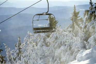 Empty ski lift chair in winter scenery, Vermont, USA - AURF06814
