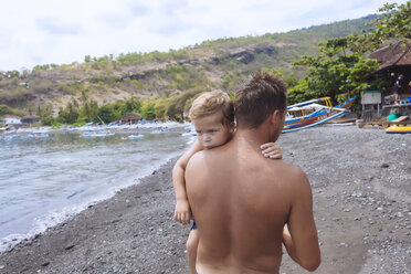 Father and son at the beach,Bali,Indonesia - AURF06899