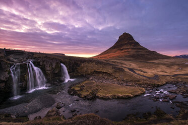 Kirkjufell mountain and waterfall at sunset in Iceland - AURF06940