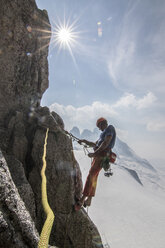 Man rock climbing at Surfs Up in Bugaboo Mountains, British Columbia, Canada - AURF07125