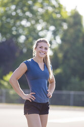 Portrait of smiling female runner, Eugene, Oregon, USA - AURF07273