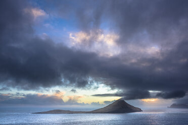 Scenery of Atlantic Ocean and mountain on island at sunset, Faroe Islands, Denmark - AURF07571