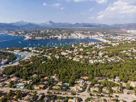 Spain, Balearic Islands, Mallorca, Aerial view of Santa Ponca, Serra de Tramuntana in the background - AMF05966