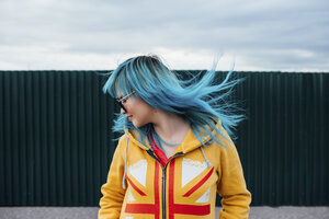 Young woman with blowing dyed blue hair - VPIF00847
