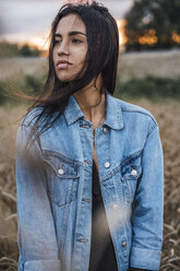 Portrait of young woman wearing denim jacket - VPIF00908