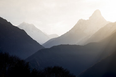 The sun rises over Ama Dablam in the Everest Region. - AURF07613