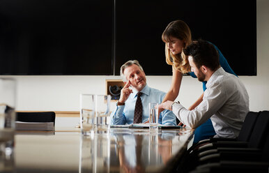 Colleagues in office in meeting - CUF44013