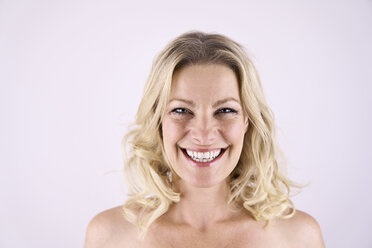 Portrait of smiling blond woman - PDF01786
