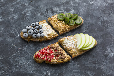 Bread slices with various toppings - JUNF01413