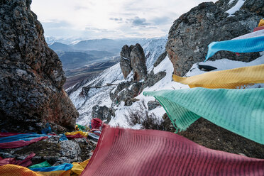 Mantra flags on mountain top, Dêngqên, Xizang, China - CUF44407