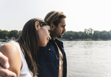 Young couple in love at the riverside - UUF15383