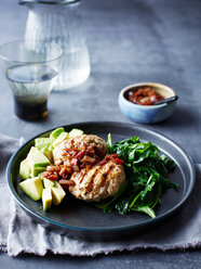 Still life with plate of chicken patty, avocado, onion and chilli jam - CUF44636