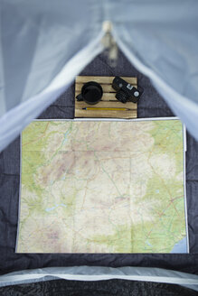 View into a tent with map, camera and - JPTF00011