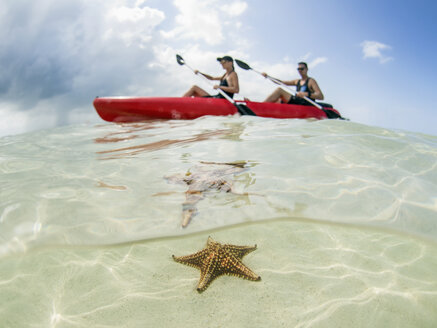 Couple kayaking on ocean at Starfish Beach, Grand Cayman, Cayman Islands - FSIF03194