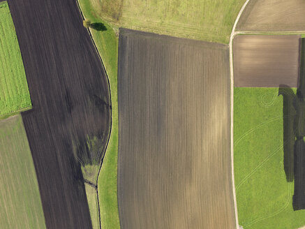 Aerial view green and brown agricultural fields, Donaueschingen, Baden-Wuerttemberg, Germany - FSIF03240