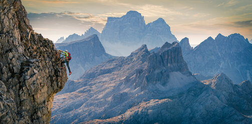 Climber on rocky wall, Dolomites, Cortina d'Ampezzo, Veneto, Italy - CUF45532