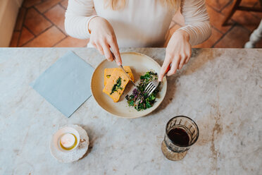 Woman having vegan meal in restaurant - CUF45871