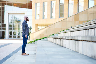 Man standing on step - CUF45947