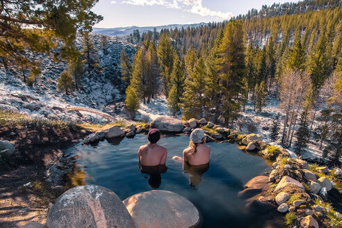 Tourists relaxing in hot spring near Bridgeport, California, USA - ISF19977