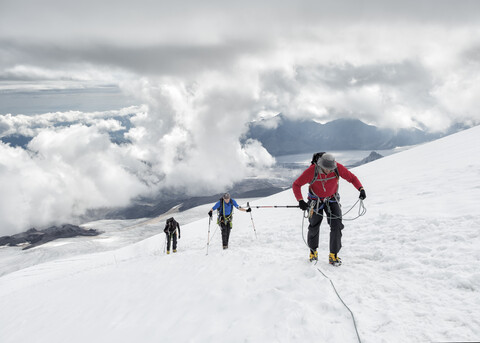 Russia, Upper Baksan Valley, Caucasus, Mountaineers ascending Mount Elbrus stock photo