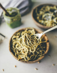 Spaghetti with pesto genovese on spoon, close-up - MBEF01436