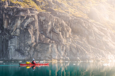 Man sea kayaking, Narsaq, Kitaa, Greenland - CUF46052