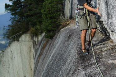 Man trad climbing at The Chief, Squamish, Canada - CUF46103