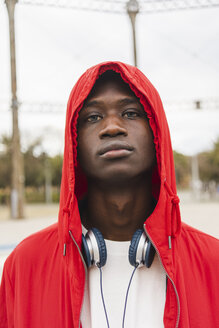 Portrait of a young black man wearing red hoodie - AFVF01807