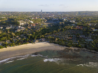 Indonesia, Bali, Aerial view of Jimbaran beach, GWK park in the background - KNTF02131