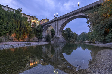 Italy, Friuli-Venezia Giulia, Cividale del Friuli, Devil's Bridge, Natisone river in the evening - HAMF00493