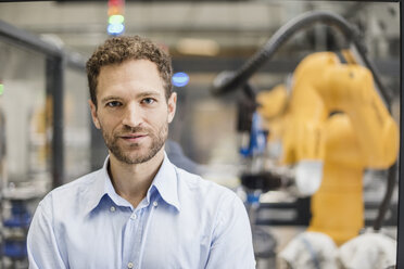 Businessman working in high tech company, portrait - DIGF05177