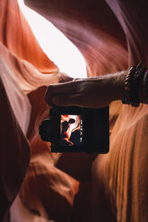 USA, Arizona, Lower Antilope Canyon, tourist photographing - KKAF02565