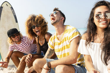 Friends sitting on the beach, having fun - WPEF00974