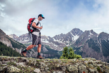 Man hiking, Mount Sneffels, Ouray, Colorado, USA - ISF20100