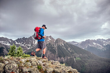 Man hiking, Mount Sneffels, Ouray, Colorado, USA - ISF20105