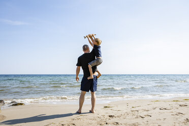 Father and son playing at the beach - OJF00288