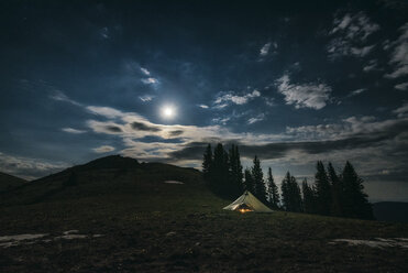 Tent on field against sky at Rocky Mountains National Park - CAVF51708