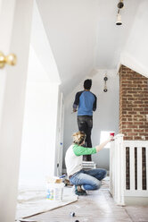 Couple renovating house - CAVF51943