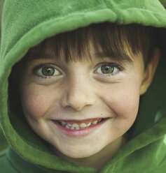 Close-up portrait of cute boy wearing hooded shirt - CAVF52092