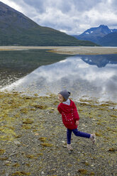 Norway, girl twisting at the beach - PSIF00141