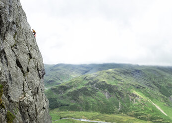 United Kingdom, Lake District, Langdale Valley, Gimmer Crag, climber on rock face - ALRF01359