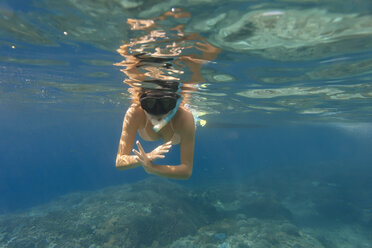 Woman snorkeling undersea - CAVF52800